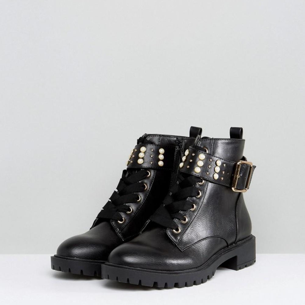 Miss KG from Kurt Geiger booties with pearls.